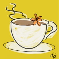a cup of coffee with a flower on it